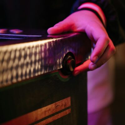 Person Holding Brown Wooden Board